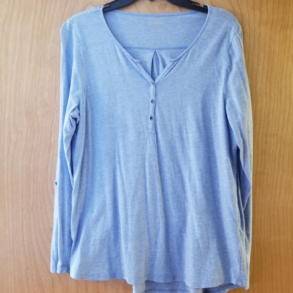 L.L. Bean blue splitneck long sleeve henley top with roll-up sleeves. Li…